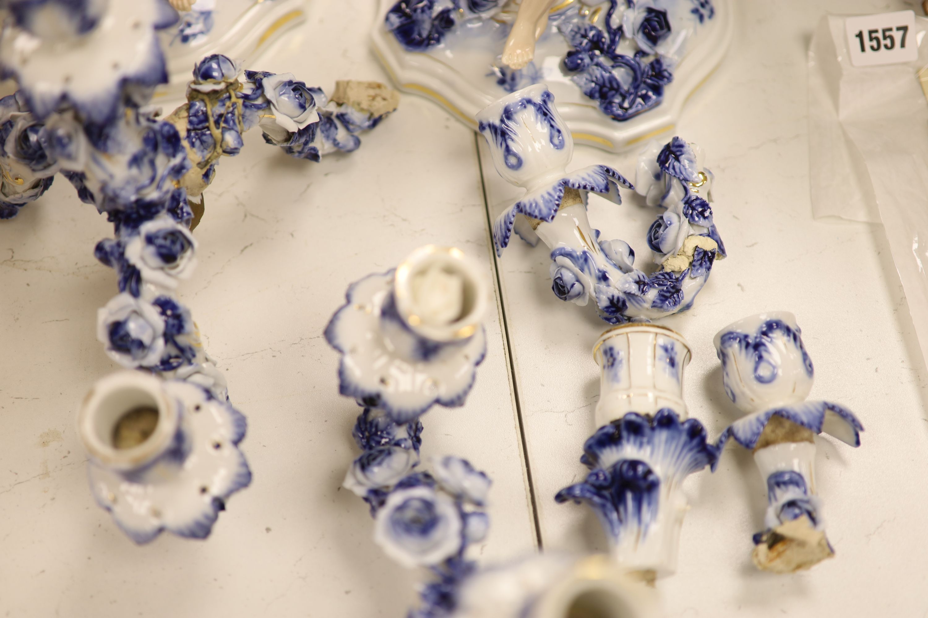 A pair of Sitzendorf figural porcelain candelabra, height 47cm